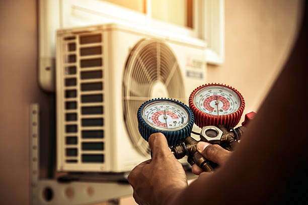 Professional Hvac technician working in Sagamore Beach, MA
